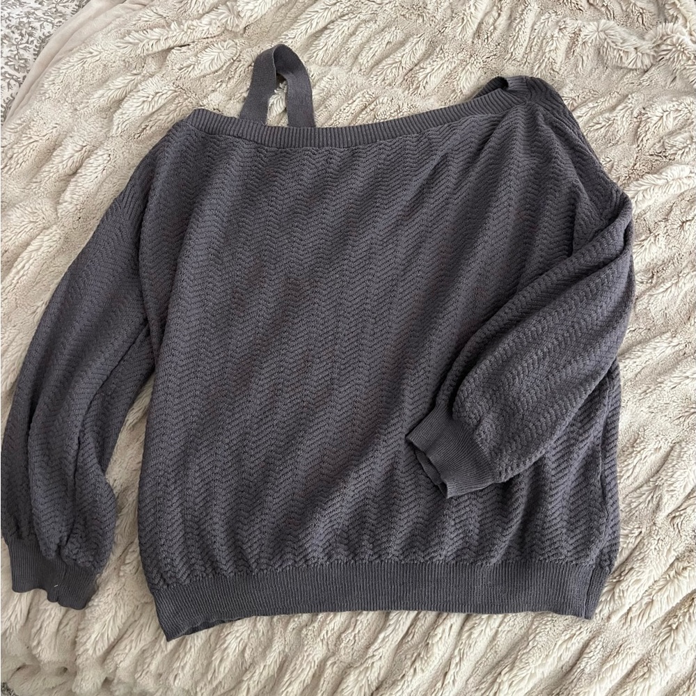 Just fab xxl thin sweater like top. Off the shoulder with strap detail